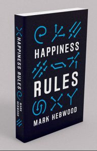 Happiness Rules book displayed on a table