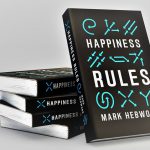 Happiness Rules books displayed on a table