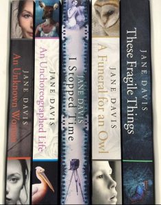 Books by Jane Davis with spines displayed