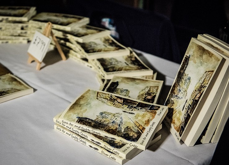 Fresh Air and Empty Streets books displayed on a table